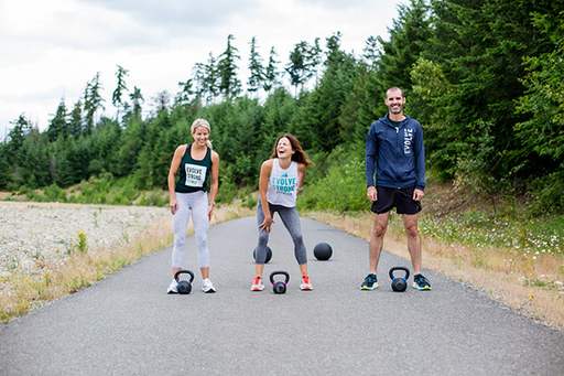 EVOLVE Strong Fitness outdoor workout with kettlebells