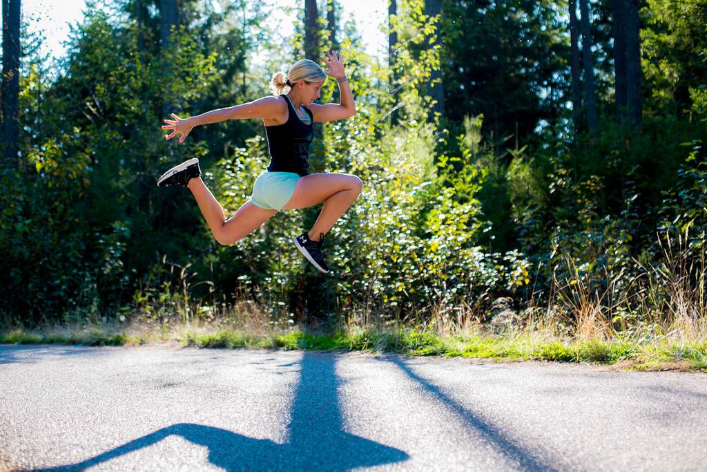 EVOLVE Strong Fitness coach outdoor run jump