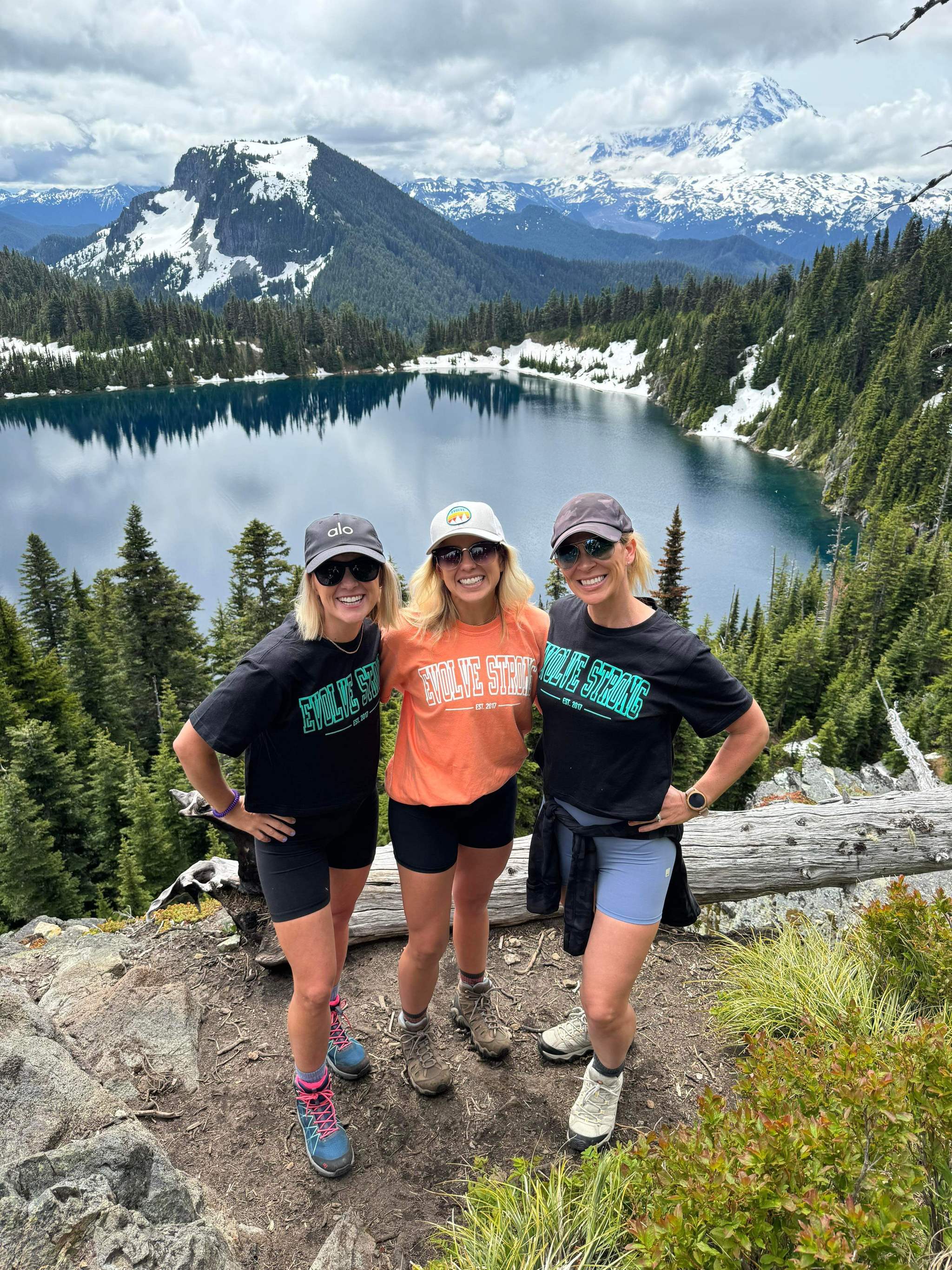 Members wearing EVOLVE Strong Fitness shirts on a hike at Mount Rainier 